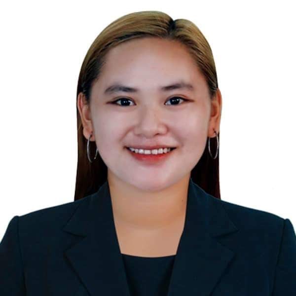 A smiling woman in a business suit, named Karen Gado.