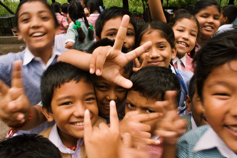 A group of children participating in a program and posing for a photo.
